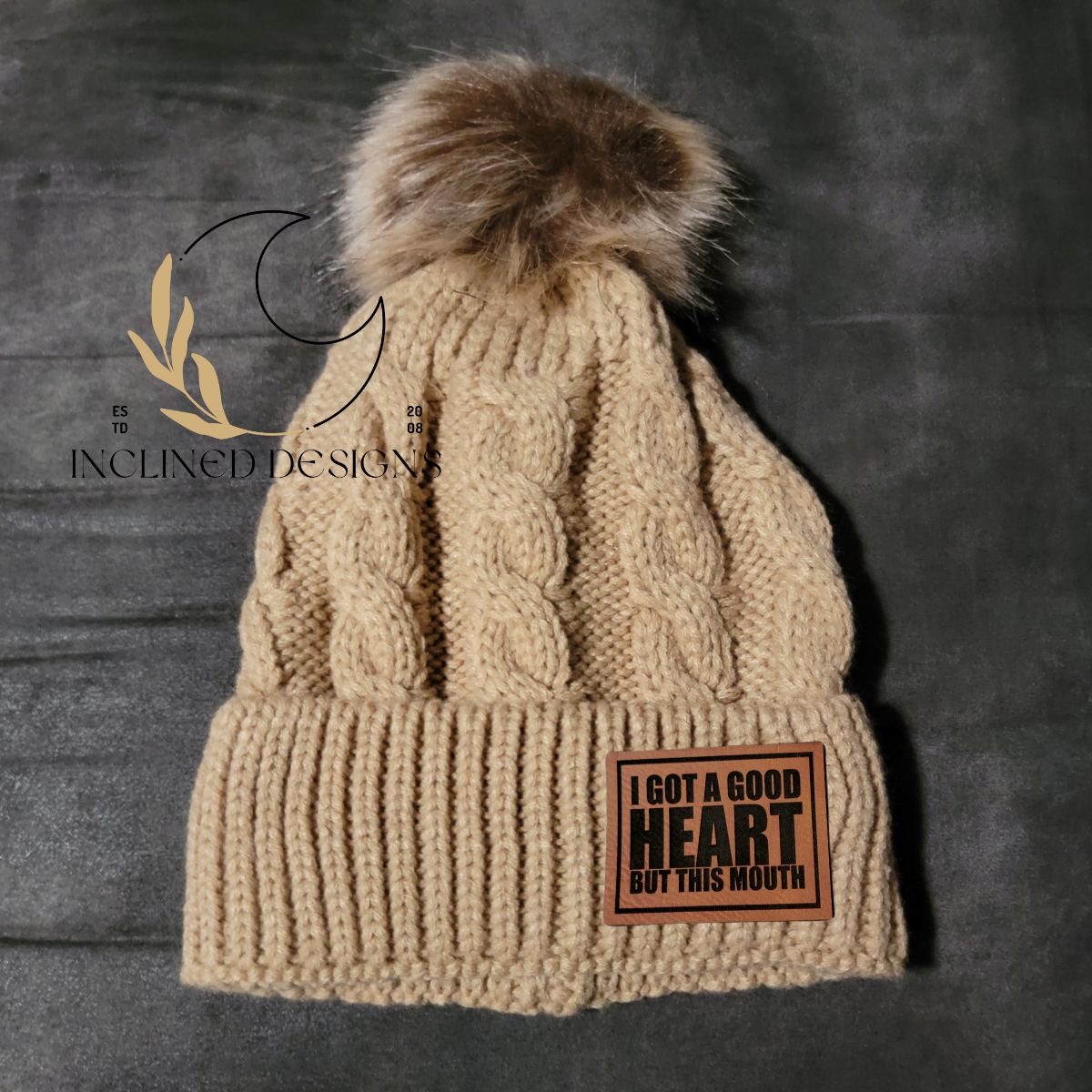 Knit Hat with Faux Fur Pom and Leatherette Patch