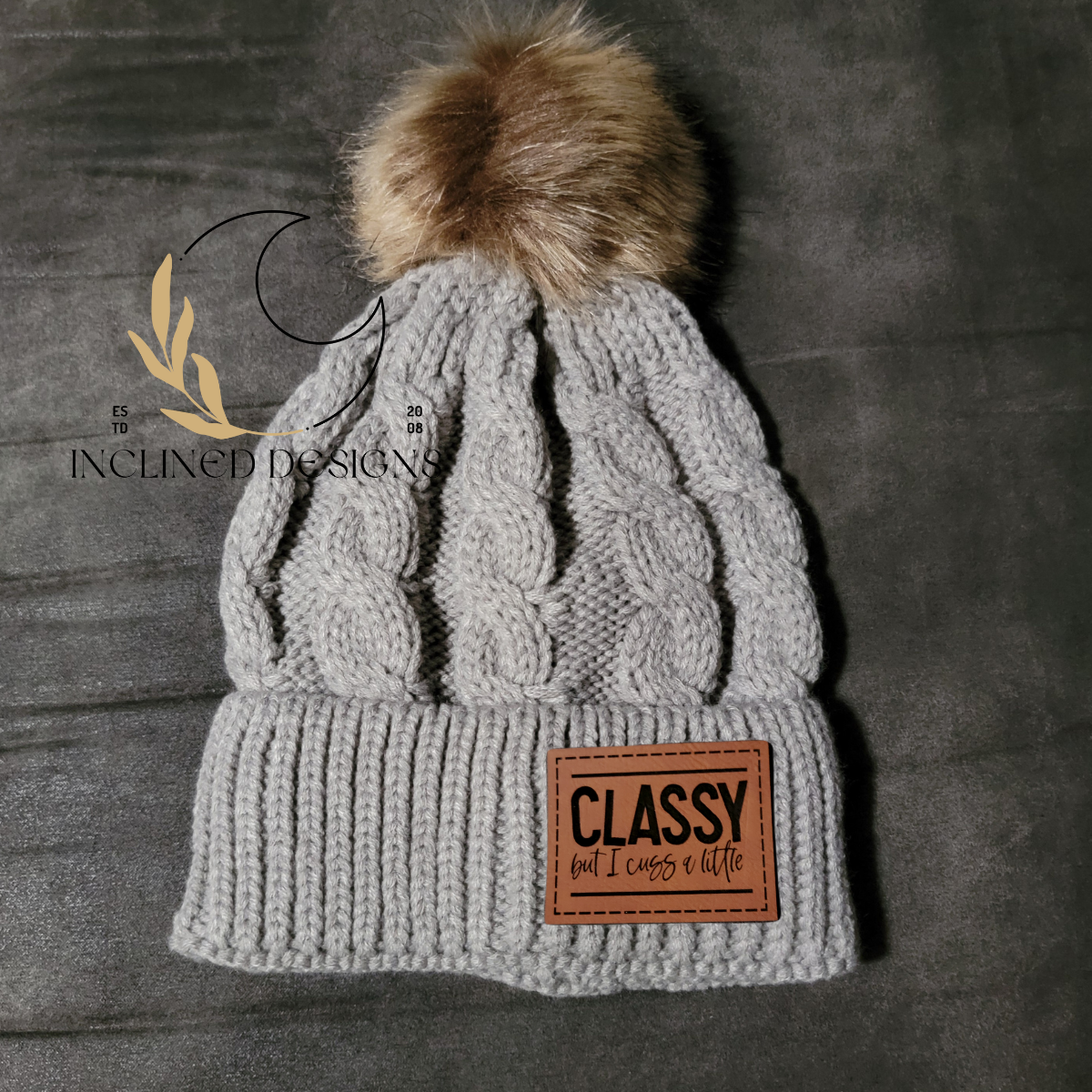 Knit Hat with Faux Fur Pom and Leatherette Patch