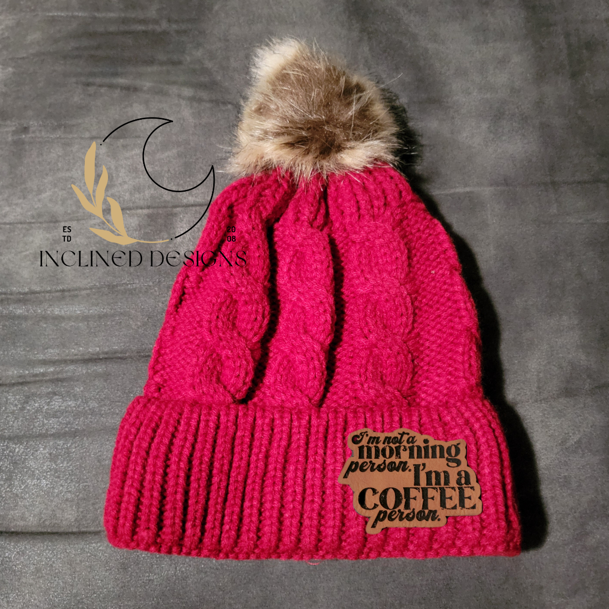 Knit Hat with Faux Fur Pom and Leatherette Patch