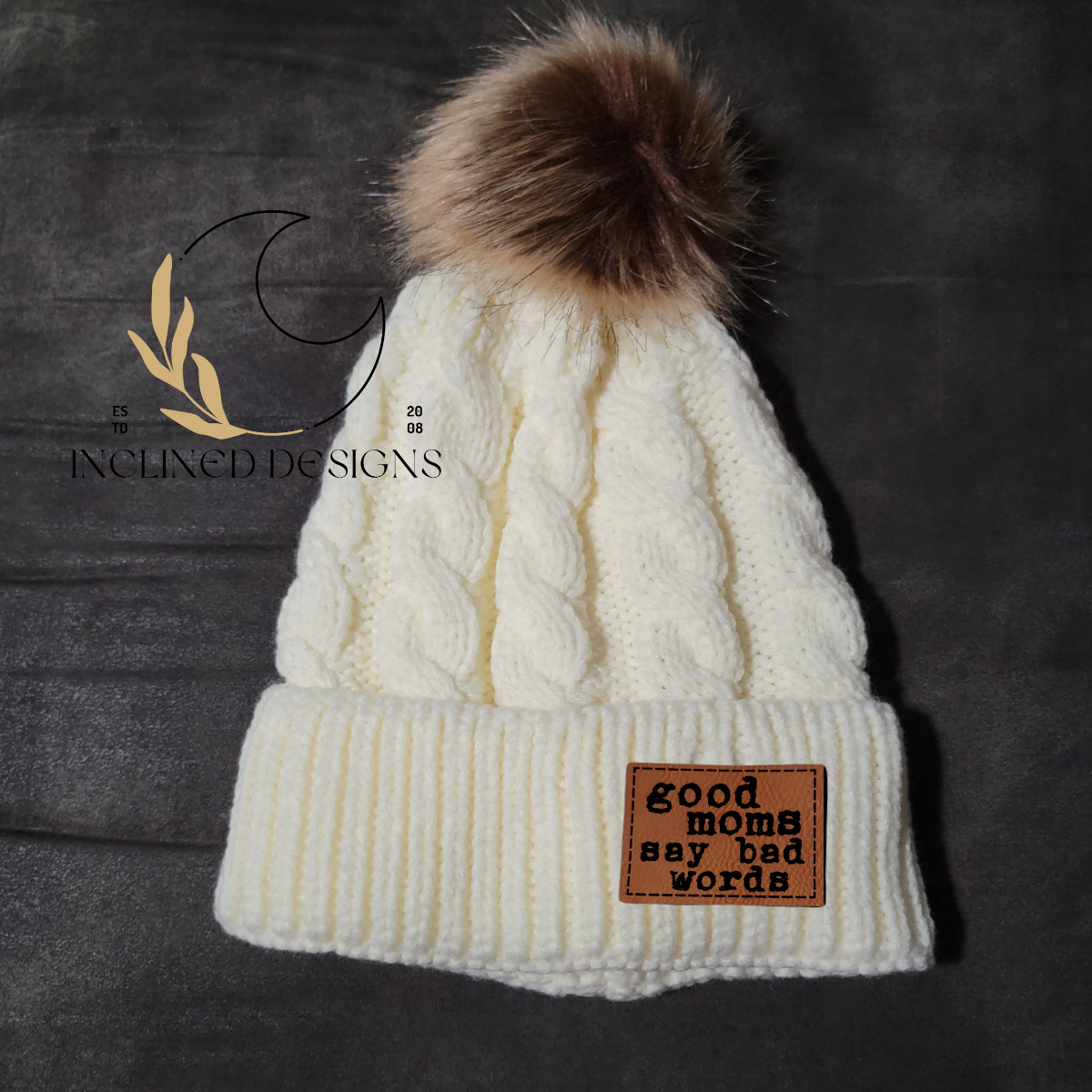 Knit Hat with Faux Fur Pom and Leatherette Patch